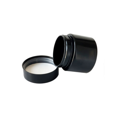 Empaquetado derecho echado a un lado de empaquetado de los tarros de la mala hierba plástica negra hermética 3oz 8vo