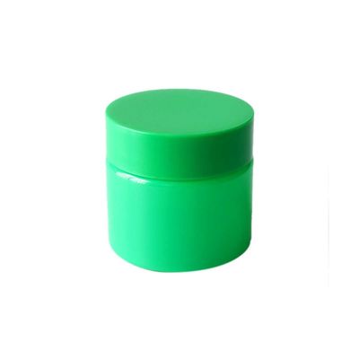 tarro plástico de la mala hierba del verde 3oz con el casquillo resistente del niño